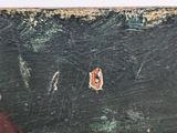 a picture of a painting of a cat on a table