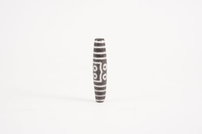 an image of a black and white vase on a white surface