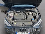 a car with its hood open and the engine in the back