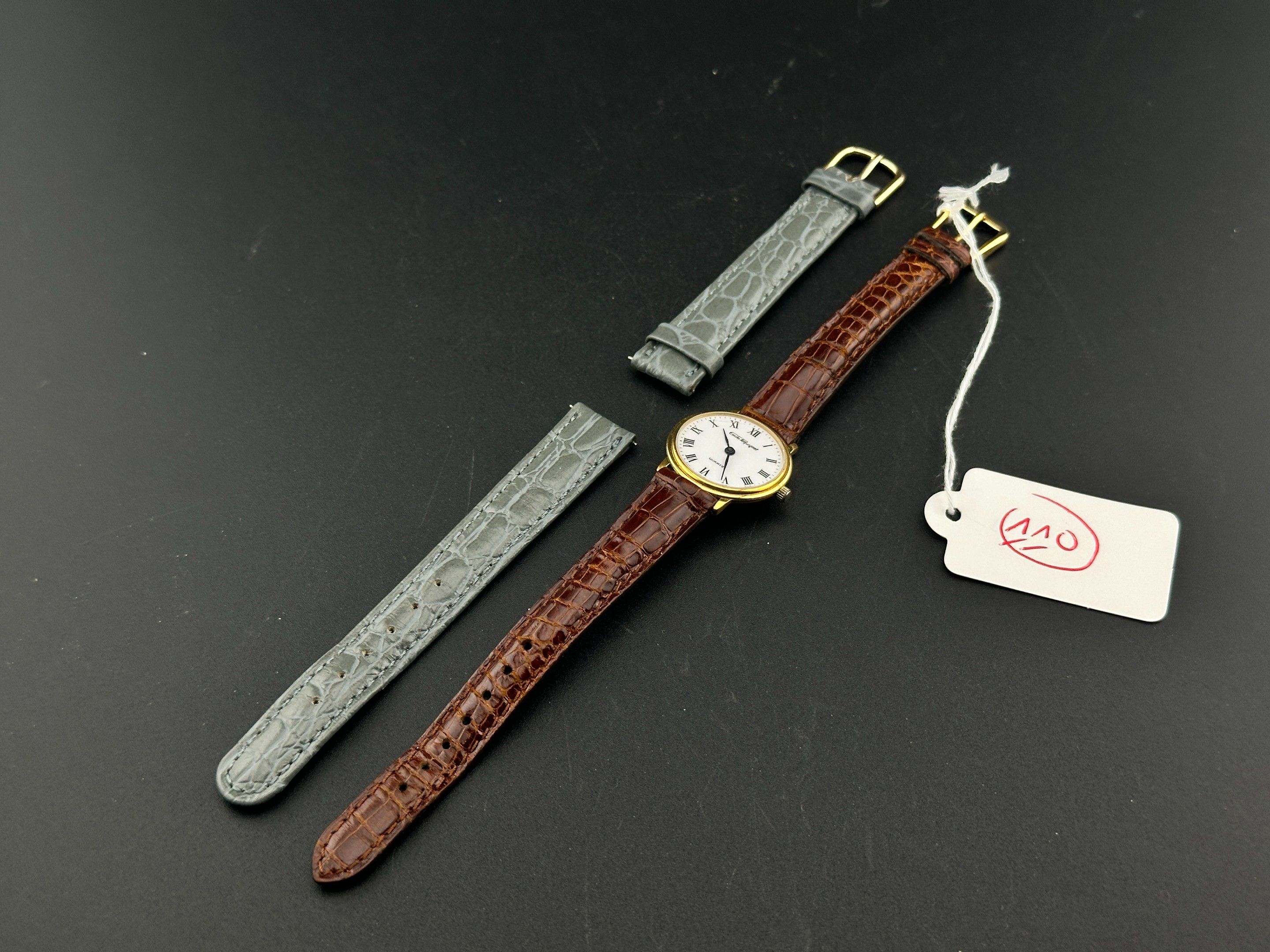 EMILE PEQUIGNET : montre bracelet de dame en métal doré, cad…