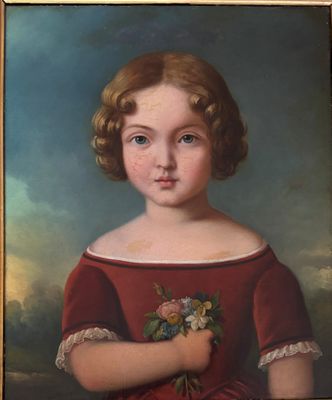 portrait of a young girl in a red dress holding a bouquet of flowers