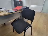 a chair that is sitting in front of a desk