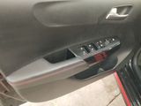 the interior of a car with the door open showing the control buttons