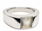 an image of a silver ring with a stone in the middle