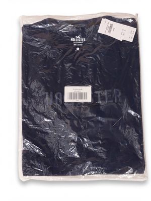 the shirt is black and has a white label on it
