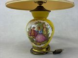 a lamp that has a picture of a woman on it