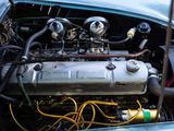 a close up of a car ' s engine in the back of the car
