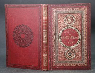 un livre rouge avec des bordures dorées et une couverture rouge