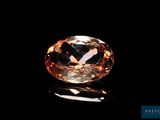 an orange diamond on a black background