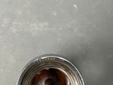 a close up of a metal object sitting on top of a table