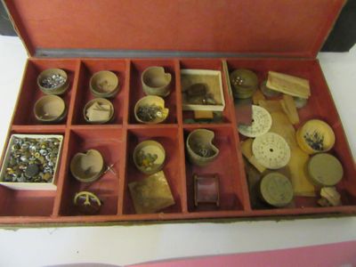 a red box with many different items inside of it