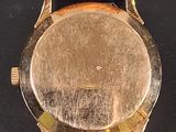 a watch that is sitting on top of a table