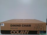 a box with a chair on top of it on a table