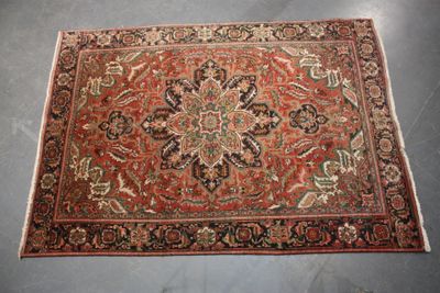 a close up of a rug on a floor with a gray floor