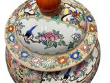 a small bowl with a lid on top of it
