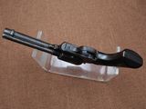 a gun that is sitting on top of a piece of plastic