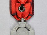 an image of a silver medal with a red ribbon on a white background