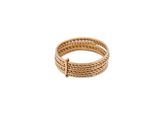 a close up of a gold ring on a white background