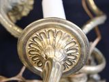a close up of a candle holder with a candle on it