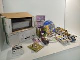 a microwave sitting on top of a counter next to other items