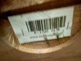 a label on the back of a suitcase that has a barcode on it