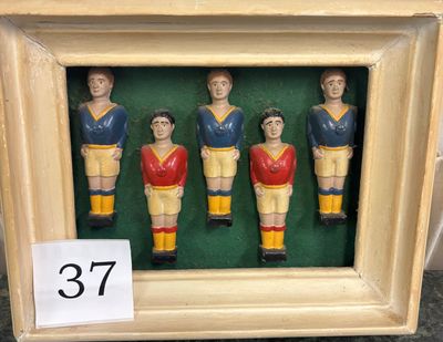 a picture of a group of figurines of soccer players