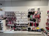 many items on the wall in the store for sale
