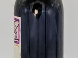a bottle of wine that is sitting on a table