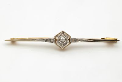 Broche barrette en or gris et or jaune (750 millièmes) centr…