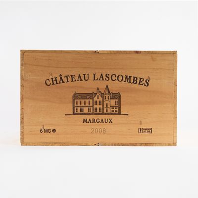 une boîte en bois sur laquelle figure l'image d'un bâtiment