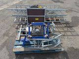 a machine that is sitting in the middle of a parking lot