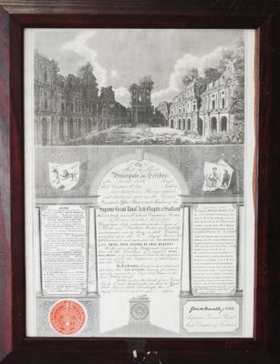une vieille photo représentant un document encadré sur lequel figure l'image d'un château