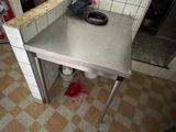 an image of a kitchen with a sink and a counter