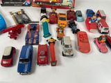 a lot of toy cars that are sitting on a table