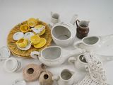 a lot of small white and yellow items on the table