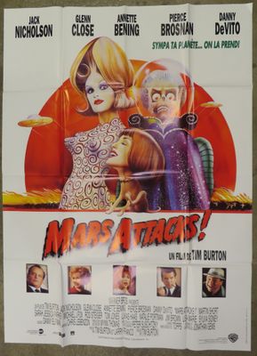 a movie poster for mars attacks starring two women and a man