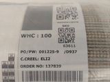 a close up of a roll of cloth with a barcode on it
