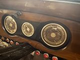 a close up of a dashboard of a vintage car