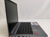 an open laptop computer sitting on top of a white table