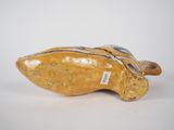 an image of a wooden shoe that is sitting on a table
