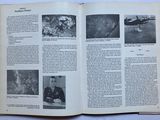 an open book with a picture of a plane in the middle of it