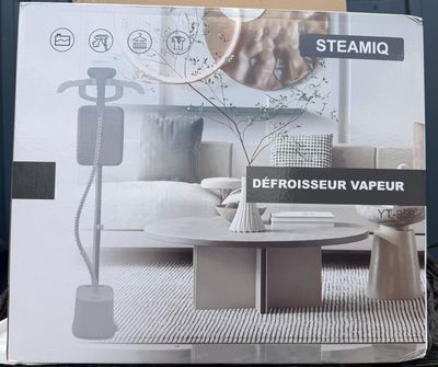 a box with a picture of a living room with a coffee table in it