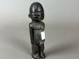 figurine in the form of a man with a bandage on his arm