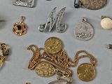 many different types of jewelry that are on the table