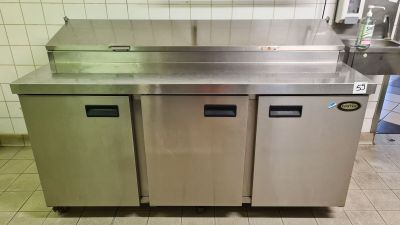 a stainless steel counter in a commercial kitchen