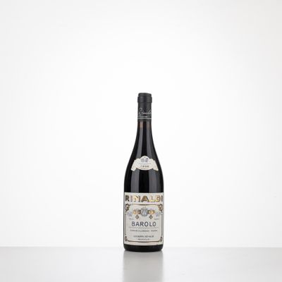 a bottle of wine sitting on top of a table