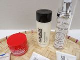 three different types of skin care products sitting on a tray