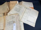 a lot of old papers that are on a table