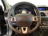 the interior of a car with a steering wheel and dashboard controls