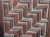 an image of a wooden door with a pattern on it
